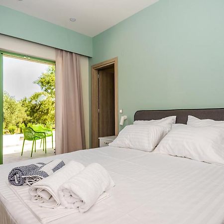 Tzogias Apartments Pan ลาสซี ภายนอก รูปภาพ