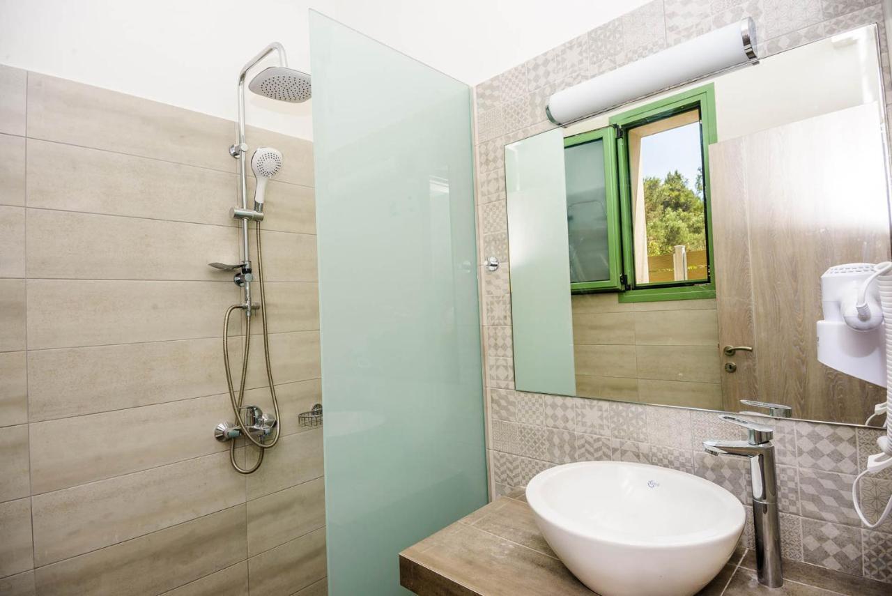 Tzogias Apartments Pan ลาสซี ภายนอก รูปภาพ