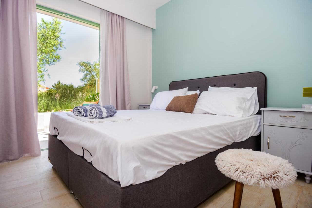 Tzogias Apartments Pan ลาสซี ภายนอก รูปภาพ
