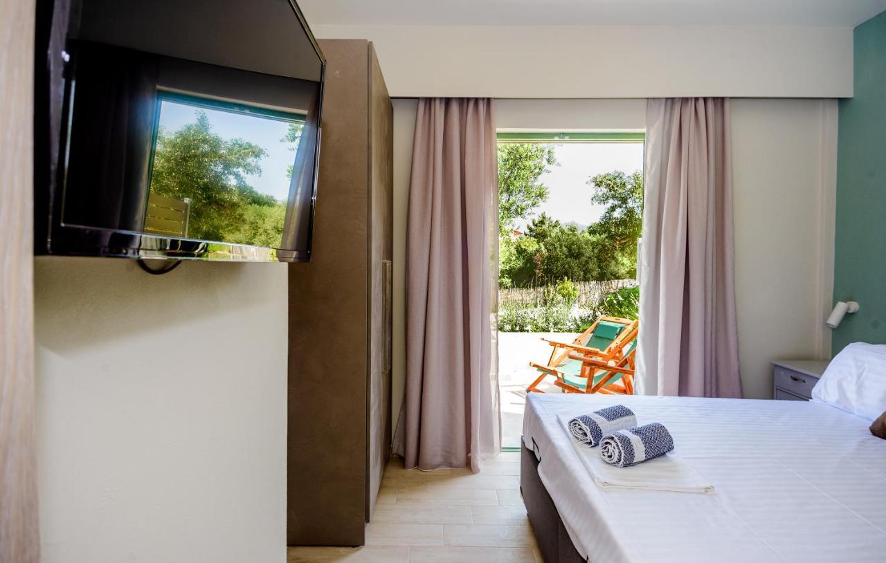 Tzogias Apartments Pan ลาสซี ภายนอก รูปภาพ